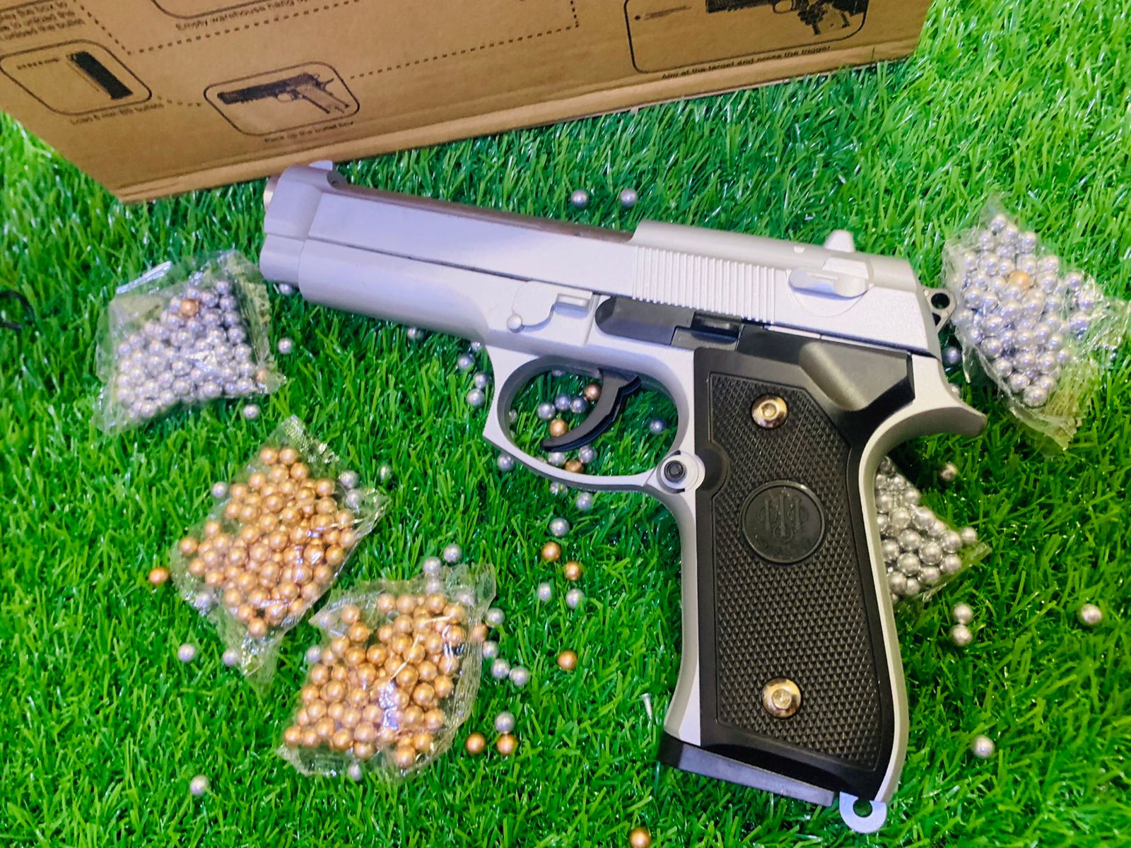 BRETTA MODEL SILVER COLOUER BB BULLET TOY MACHINE PLASTIC BODY AND METAL PARTS AND WEIGHT FOR BEST LIKE REAL MACHINE